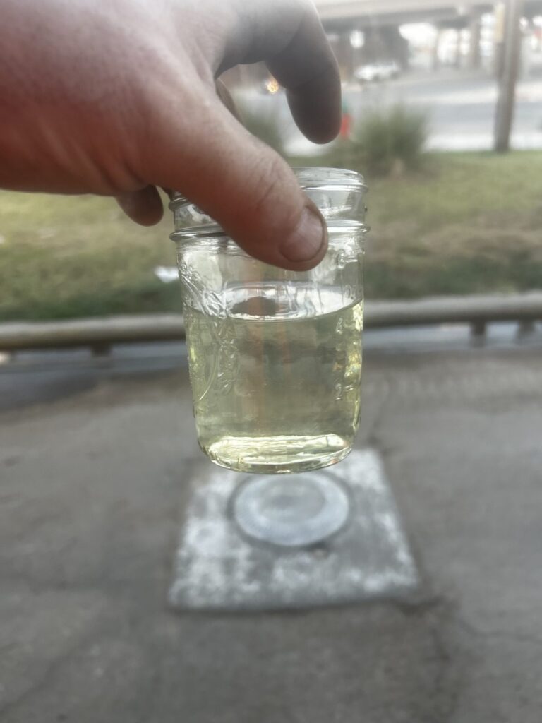 Clear fuel in a jar after filtering