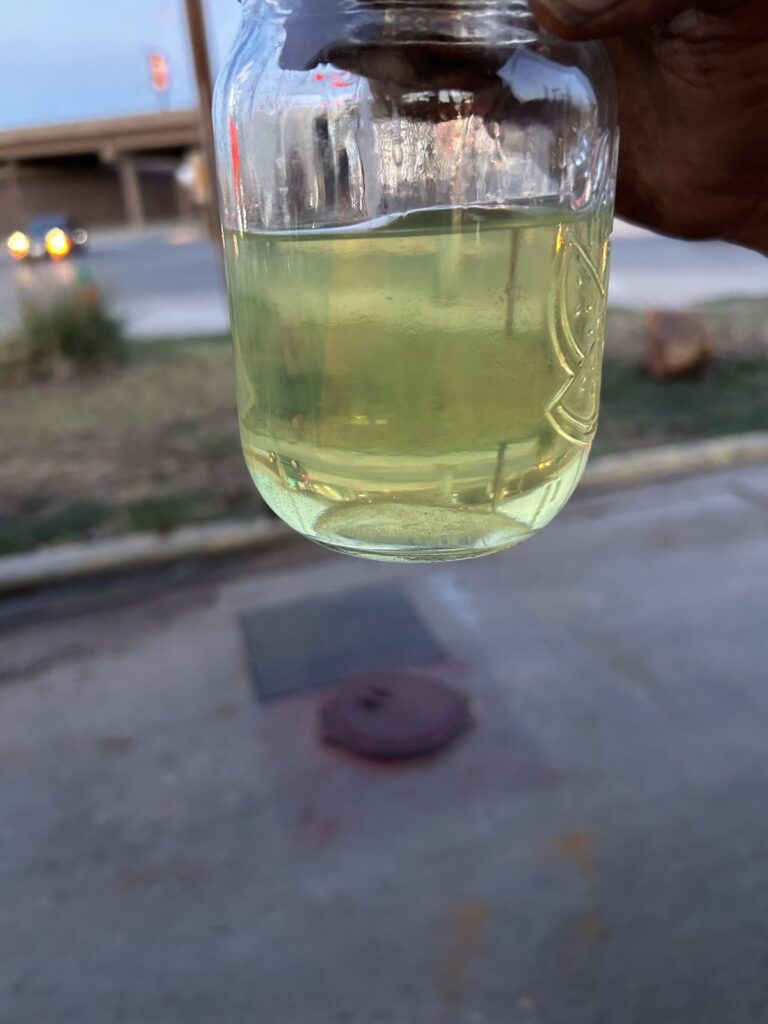 Pale clear fuel after filtering